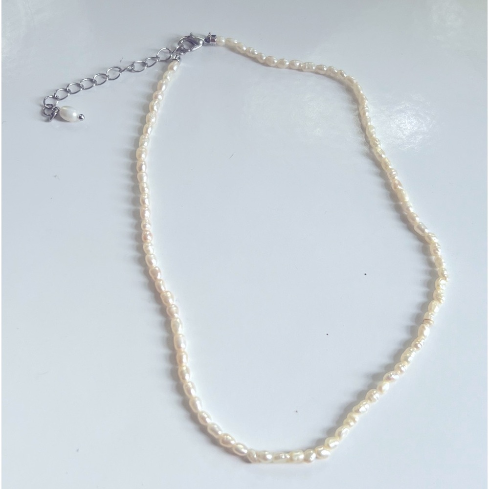 Genuine Pearl necklace with a silver clasp and adjustable length